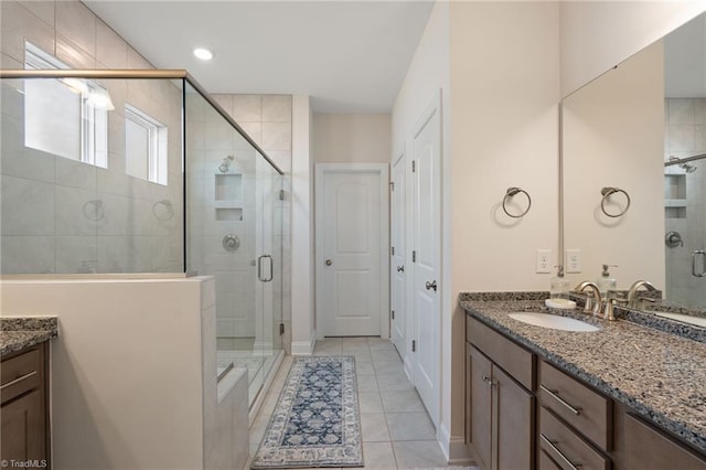 4077 Glenn Knoll Ln, Winston-Salem, NC 27107 - full bathroom featuring vanity, a shower stall, and tile patterned floors