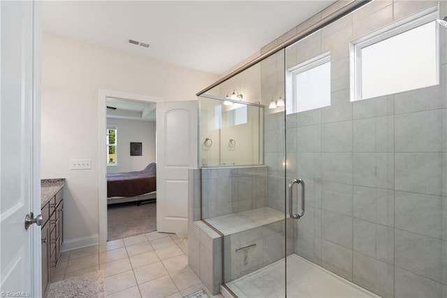 4077 Glenn Knoll Ln, Winston-Salem, NC 27107 - ensuite bathroom with vanity, a shower stall, baseboards, and tile patterned flooring