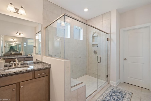 4077 Glenn Knoll Ln, Winston-Salem, NC 27107 - full bathroom featuring a stall shower, vanity, and tile patterned floors