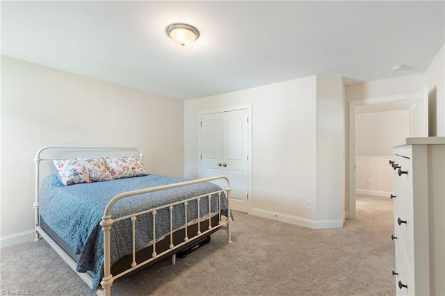 4077 Glenn Knoll Ln, Winston-Salem, NC 27107 - carpeted bedroom with baseboards and a closet