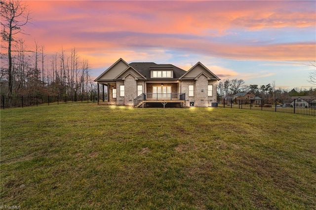 view of front of home featuring a yard