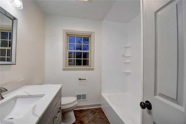 full bathroom with tile patterned flooring, vanity, toilet, and shower / tub combination