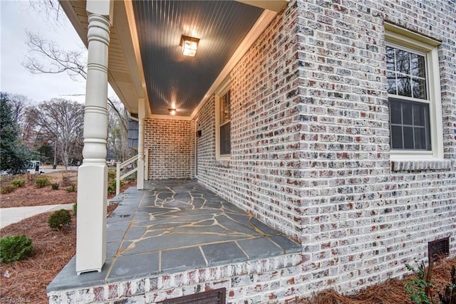 doorway to property featuring a porch