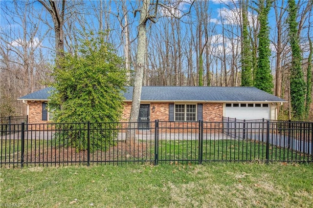 view of front of property with a garage, a front yard, brick siding, and fence private yard