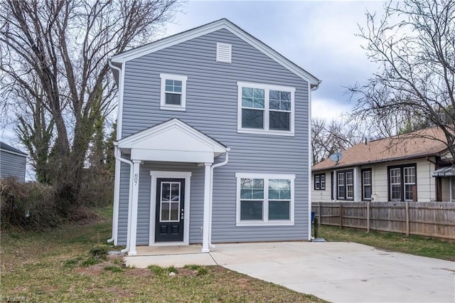 807 Akron Dr, Winston-Salem, NC 27105 - traditional-style house with fence and a patio