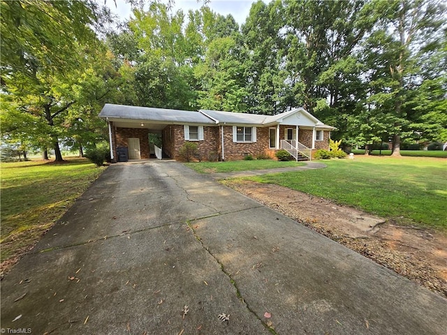 single story home with a front lawn and a carport