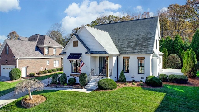 view of front of home with a front yard