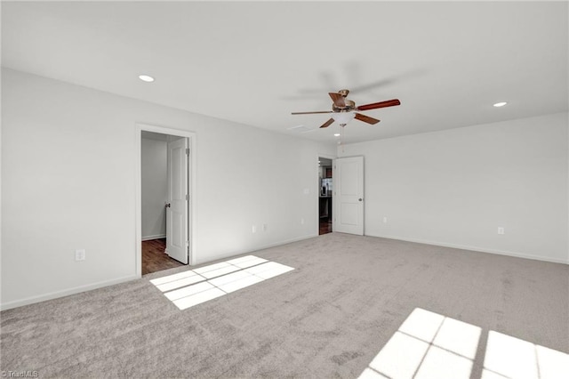 731 Torbay Dr, Mcleansville, NC 27301 - unfurnished bedroom with a spacious closet, baseboards, carpet floors, and recessed lighting