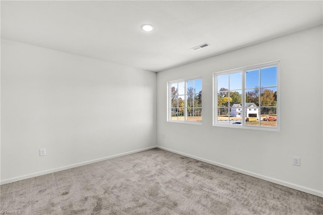 731 Torbay Dr, Mcleansville, NC 27301 - carpeted spare room featuring baseboards, visible vents, and recessed lighting