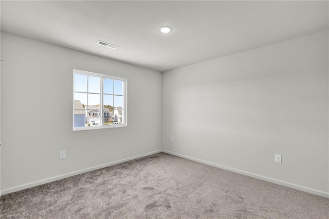 731 Torbay Dr, Mcleansville, NC 27301 - carpeted spare room with baseboards, visible vents, and recessed lighting
