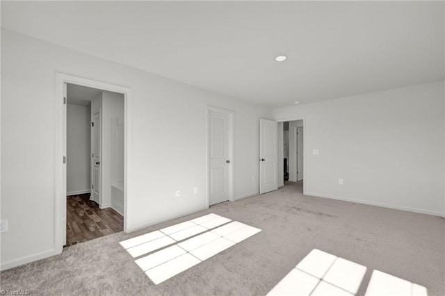 731 Torbay Dr, Mcleansville, NC 27301 - unfurnished bedroom with baseboards and carpet floors