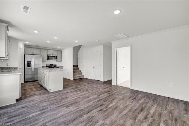 731 Torbay Dr, Mcleansville, NC 27301 - kitchen with a center island, a sink, appliances with stainless steel finishes, visible vents, and recessed lighting