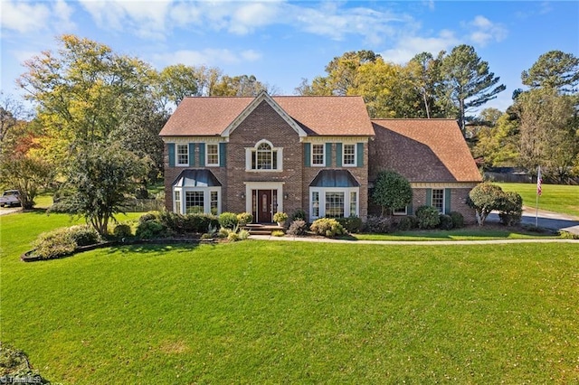 view of front of home with a front yard