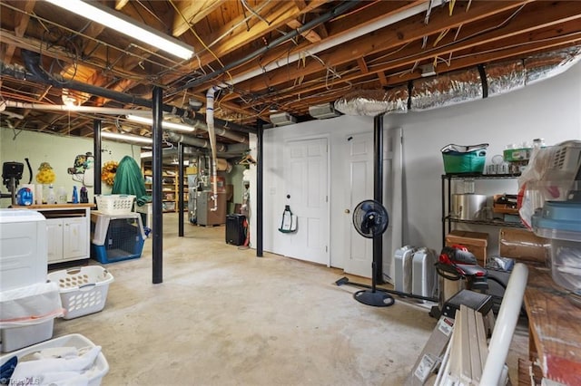 unfinished basement featuring heating unit