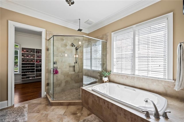full bath with tile patterned flooring, ornamental molding, a bath, and a stall shower