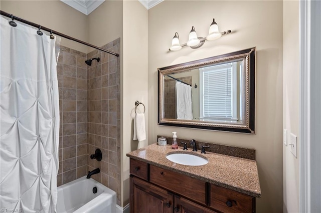 bathroom with vanity, ornamental molding, and shower / tub combo