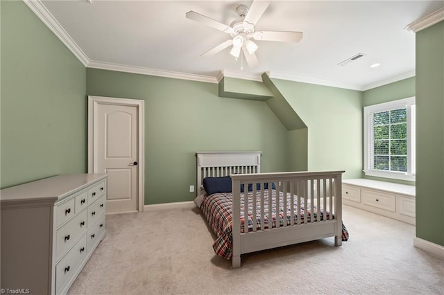 bedroom with crown molding, baseboards, light carpet, and visible vents