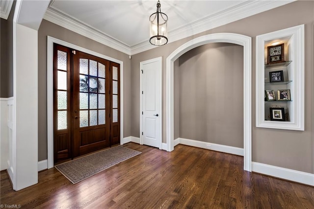 entryway with dark wood-type flooring and baseboards