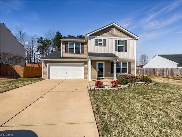 traditional home with concrete driveway, a garage, fence, and a front lawn