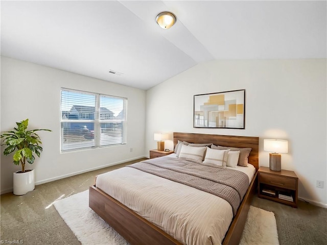 carpeted bedroom featuring visible vents, baseboards, and lofted ceiling