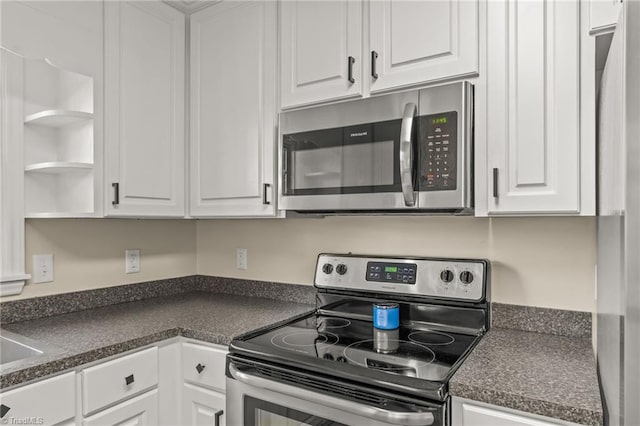 kitchen featuring white cabinets and stainless steel appliances