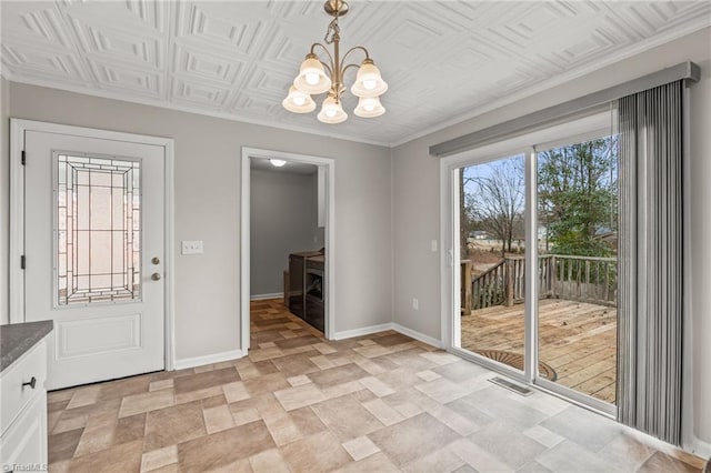 entryway featuring an inviting chandelier