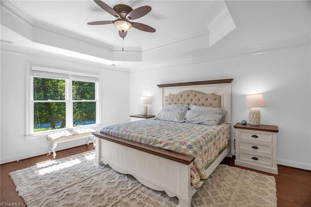 6707 Fegan Rd, Summerfield, NC 27358 - bedroom featuring a raised ceiling, wood finished floors, ornamental molding, and ceiling fan