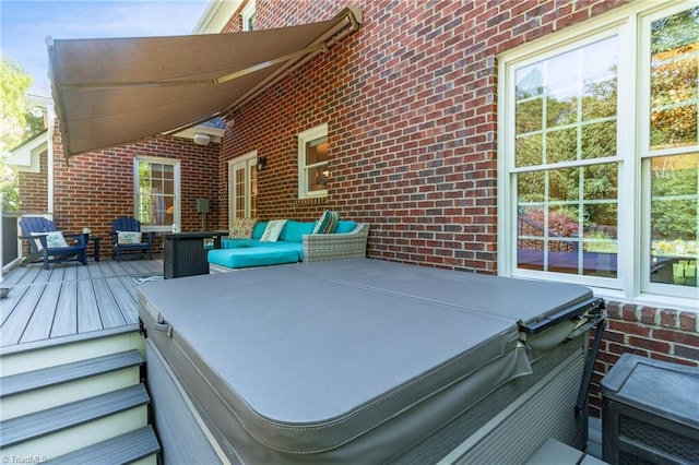 6707 Fegan Rd, Summerfield, NC 27358 - wooden terrace featuring a hot tub and outdoor lounge area