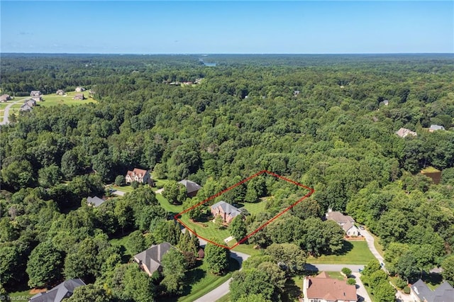 6707 Fegan Rd, Summerfield, NC 27358 - aerial overview of property's location with a forest and property parcel outlined