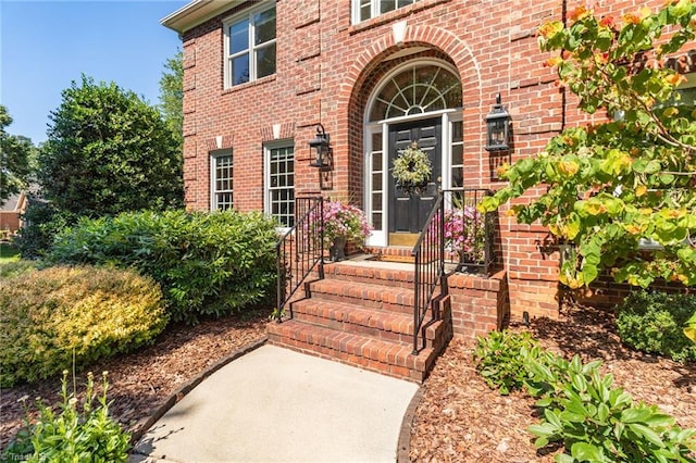 6707 Fegan Rd, Summerfield, NC 27358 - view of exterior entry featuring brick siding