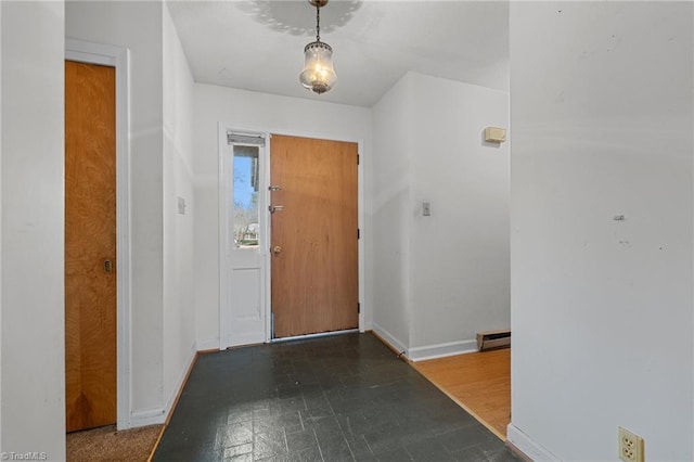 foyer featuring a baseboard radiator