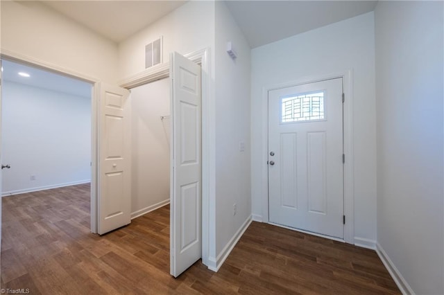 foyer entrance featuring dark hardwood / wood-style flooring