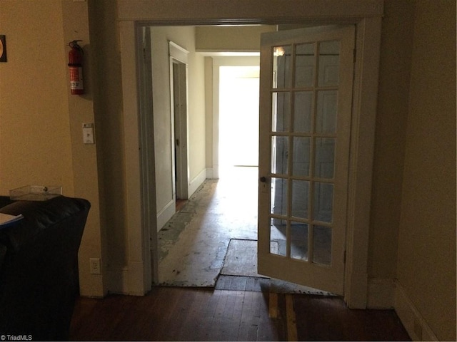 hall featuring wood-type flooring