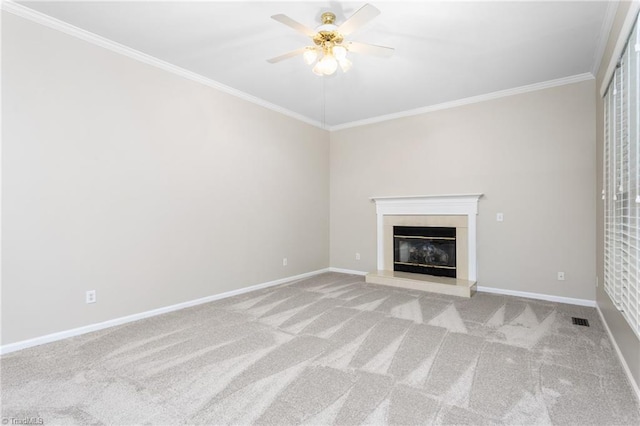 4 Beech Grove Ct, Greensboro, NC 27455 - unfurnished living room featuring a ceiling fan, carpet floors, ornamental molding, a glass covered fireplace, and baseboards