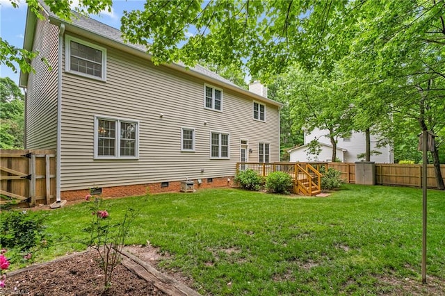 4 Beech Grove Ct, Greensboro, NC 27455 - back of property featuring crawl space, a chimney, and a wooden deck