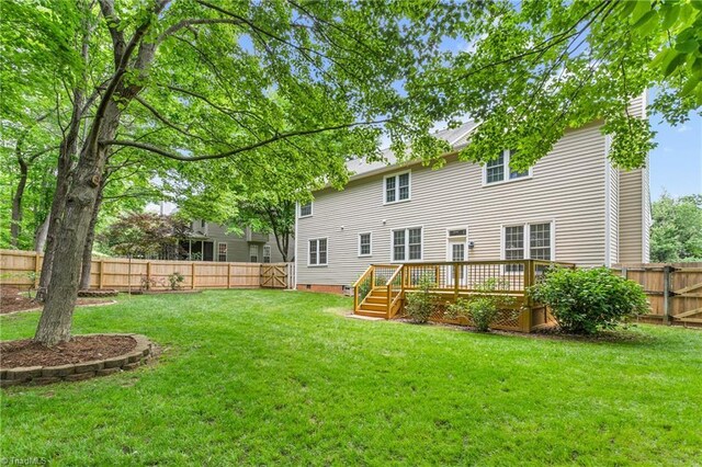 4 Beech Grove Ct, Greensboro, NC 27455 - rear view of house featuring a wooden deck and crawl space