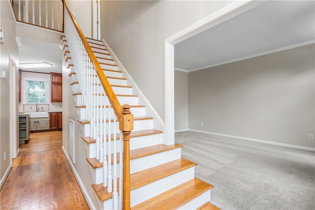 4 Beech Grove Ct, Greensboro, NC 27455 - stairs with ornamental molding, baseboards, and wood finished floors