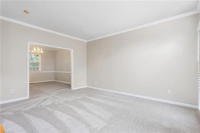 4 Beech Grove Ct, Greensboro, NC 27455 - empty room featuring crown molding, a chandelier, light colored carpet, and baseboards