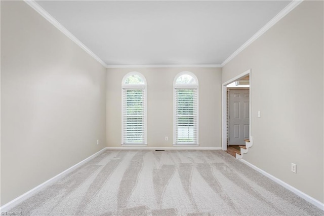 4 Beech Grove Ct, Greensboro, NC 27455 - spare room with ornamental molding, baseboards, and light carpet