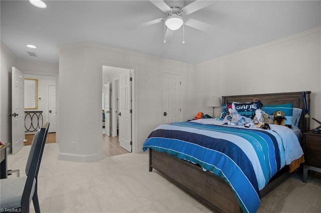 bedroom with ceiling fan, visible vents, carpet, baseboards, and ornamental molding