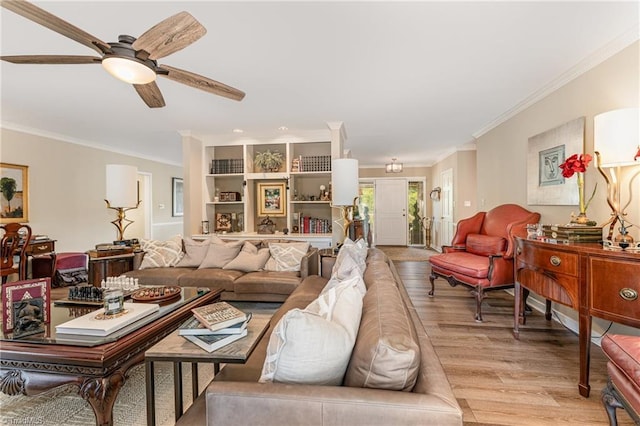 1312 Gilbrook Ct, High Point, NC 27262 - living area with crown molding, light wood-style floors, and ceiling fan