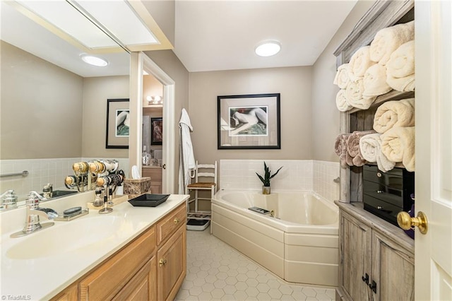 1312 Gilbrook Ct, High Point, NC 27262 - full bath featuring vanity, a bath, and tile patterned flooring