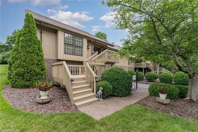 1312 Gilbrook Ct, High Point, NC 27262 - view of front of property with stairway and brick siding