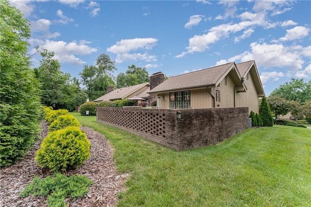 1312 Gilbrook Ct, High Point, NC 27262 - back of house with a yard and a chimney