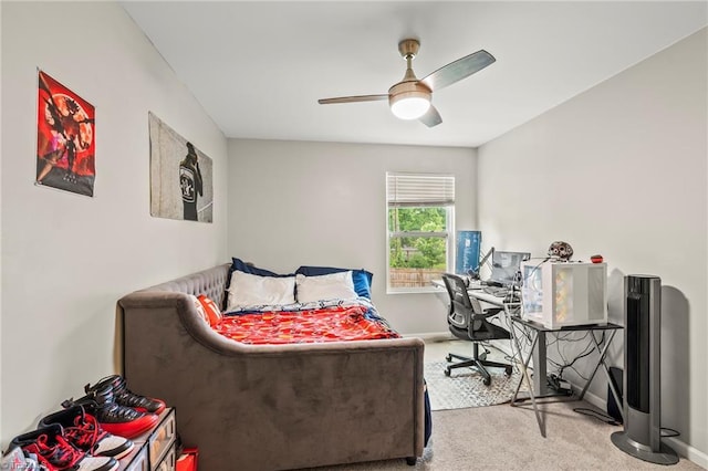 bedroom featuring carpet, baseboards, and a ceiling fan