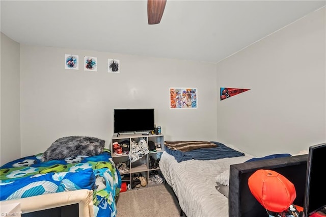 carpeted bedroom featuring a ceiling fan