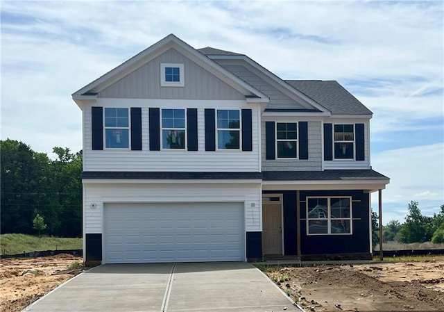 717 Brooklet Ct, Winston-Salem, NC 27127 - view of front of home featuring driveway, an attached garage, a porch, and roof with shingles