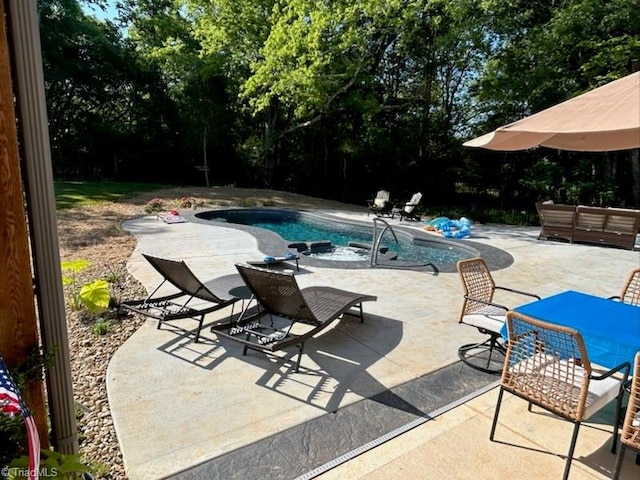 outdoor pool with a patio