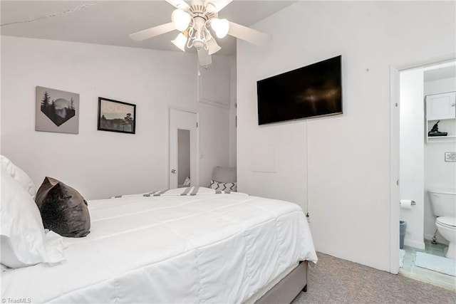 carpeted bedroom featuring lofted ceiling and ceiling fan