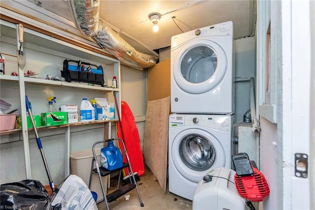 laundry room with stacked washer and dryer